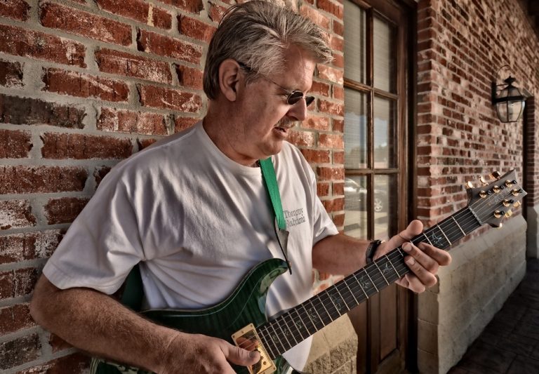 Dr. Norowski with Guitar